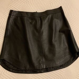 Black leather mini skirt